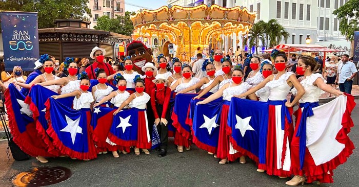 Parade rican puts spectators entertains unit honors trailblazers ruttle